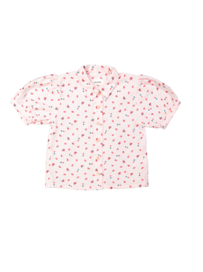 Blouse rouge objets rose clair